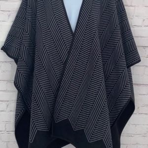 Poncho mujer taller único negro reversible